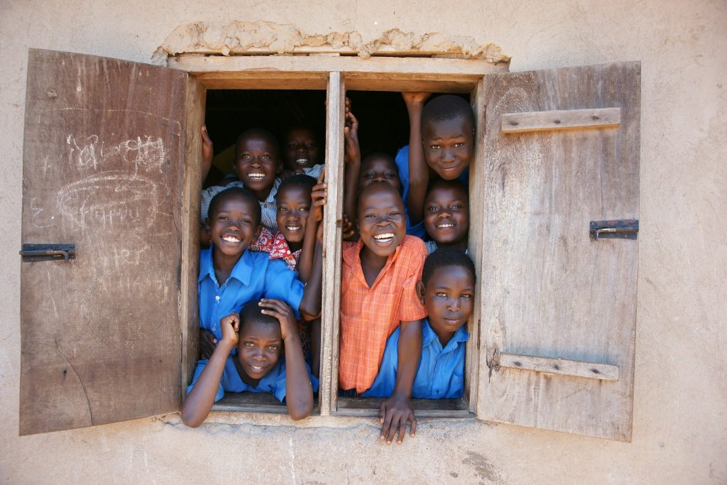Young writers at a school window