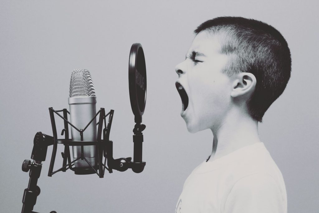 A young performer at the microphone